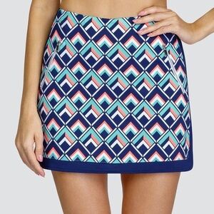 🔷 TAIL Mini Athletic Golf Skort • Navy, Peach, White Geometric Design